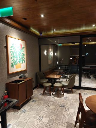 Hidden Between Houses and Green Front Yards... A Starbucks?!