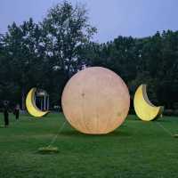 🌙 Fuxing Park: Moon Phases Art in the French Concession