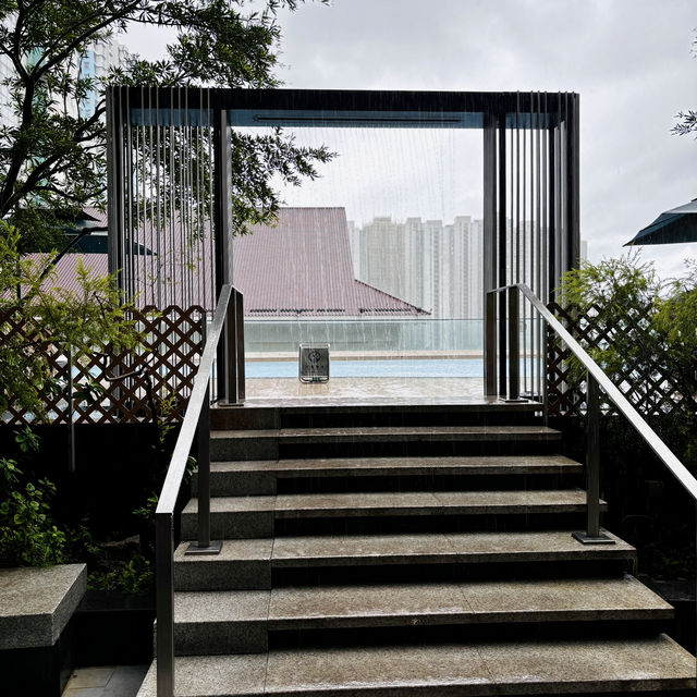 "Infinity Pool at Courtyard by Marriott Shatin: A Panoramic Oasis"