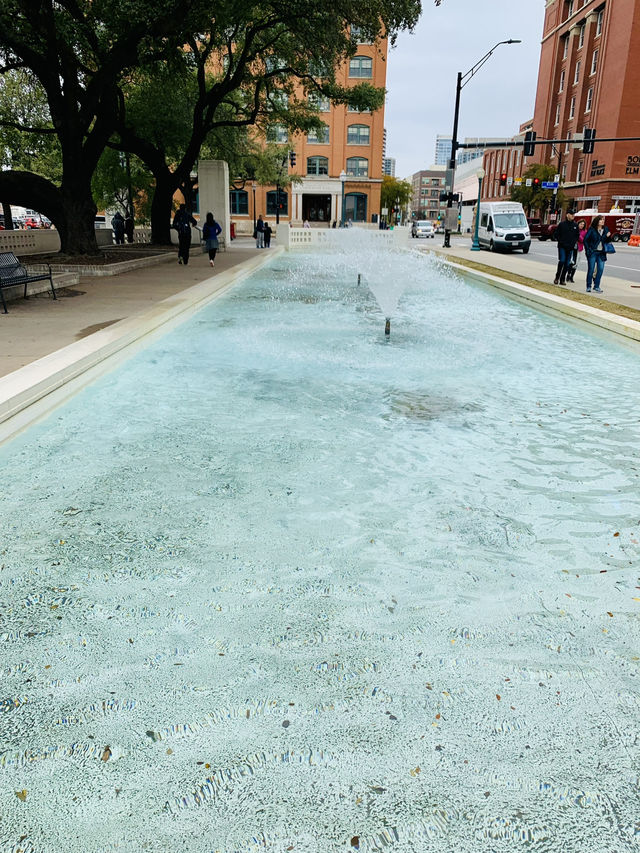 “Reflect at the John F. Kennedy Memorial in Dallas”