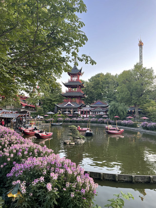 Still Water Silent Beauty: Tivoli's Pagoda 🌊✨ 🏗️🏮