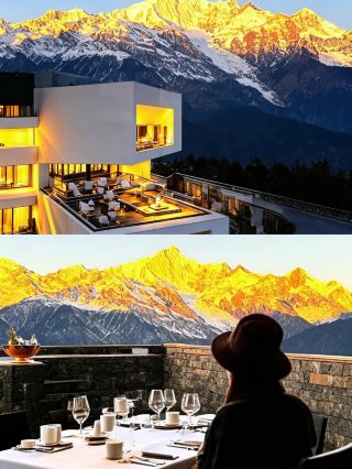 View the golden sunrise over Meili Snow Mountain directly from your room at Deqin Meili Podu Hotel