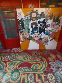 Rainbow Village: A Colorful Legacy of Rainbow Grandpa's Art