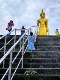 A colossal standing Golden Buddha in Hatyai