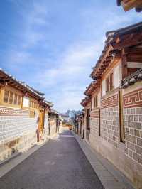 Bukchon Hanok Village: Time-Travel Through Seoul’s Most Photogenic Alleys"** 🏮🏡