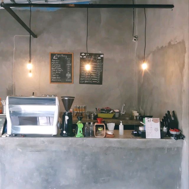 ONE OF THE COFFEE SHOPS NEAR A TRANSJAKARTA BUS STOP