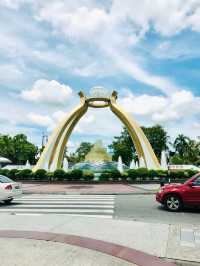 “The Shimmering Gateway: Jerudong Park’s Crystal Arch”