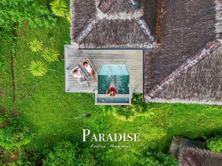 Sleep on a paradise island with a million-dollar view and a private beach.