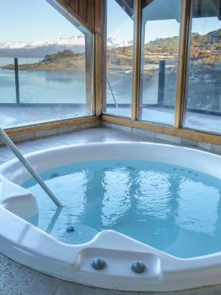 🌟 Ushuaia's Luxe Retreat: Los Cauquenes Resort 🏔️✨