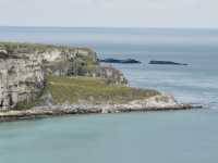 April in Ballintoy: A Coastal Church Scene
