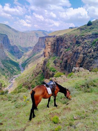Must-visit place in Lesotho: Pristine high mountain canyon waterfall