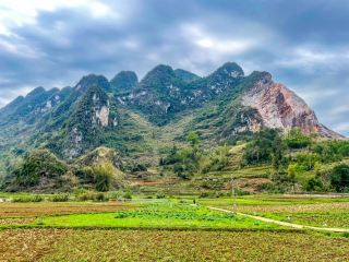 High mountains and lush green fields... A beautiful rural village.