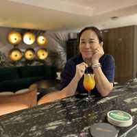 Sip from your choice of drink at the snazzy 137 Bar at Courtyard KL South