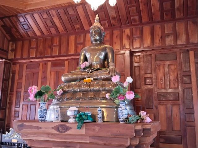 Visit the Majestic Reclining Buddha at Wat Hat Yai Nai