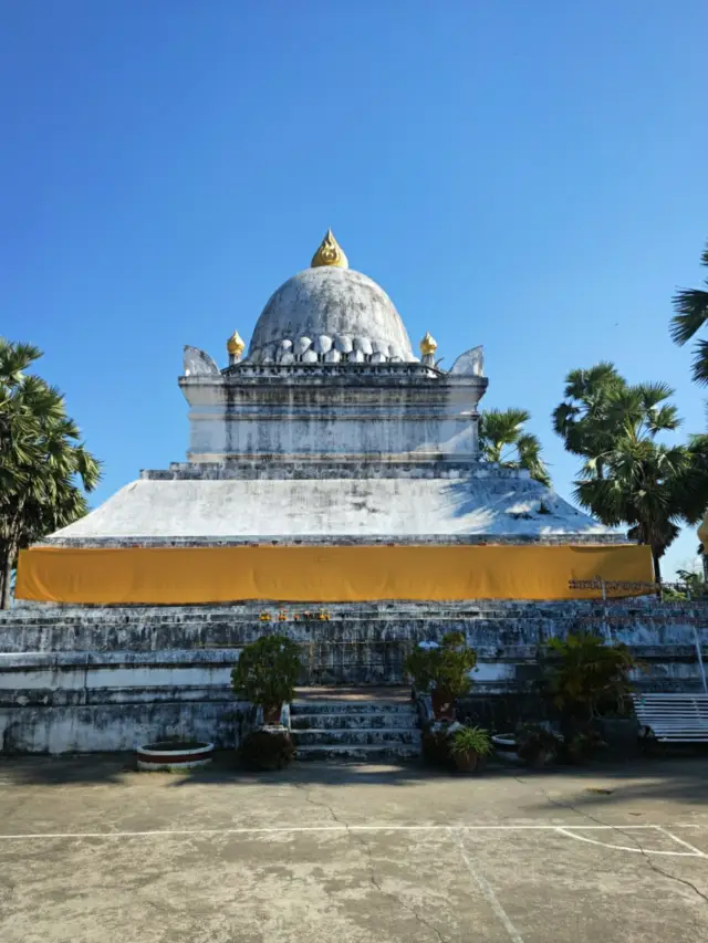 Laos | Luang Prabang's largest Buddha statue and the only Sangharama-style pagoda