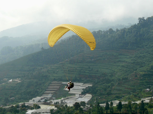 Fly High: My Epic Paragliding Adventure at Paralayang Puncak