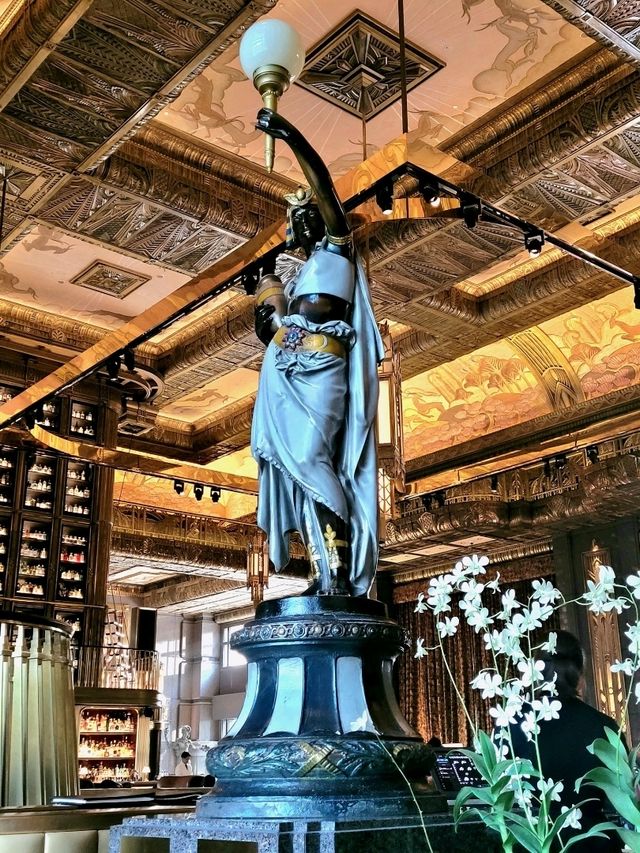 Heroic sculptures at ATLAS bar