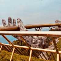 🌉✨ *Golden Bridge (Cầu Vàng): Vietnam’s Giant Hands Holding a Gilded Pathway* 🏞️🌿