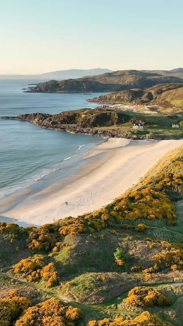 Experience pure magic as the sun paints the sky in hues of gold at Camusdarach Beach!