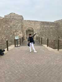 “Whispers of the Past: The Timeless Walls of Bahrain Fort”