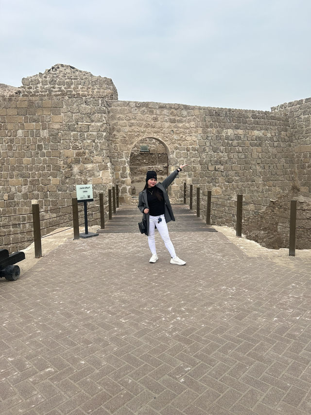 “Whispers of the Past: The Timeless Walls of Bahrain Fort”