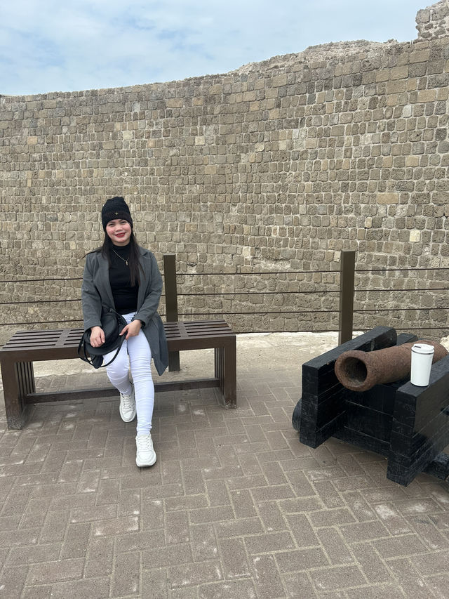 “Whispers of the Past: The Timeless Walls of Bahrain Fort”