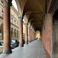 🏛️ “Where Red Brick Breathes: A Pause in Piazza Maggiore”