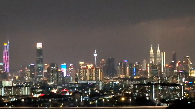 ​"Symphony of Lights: Unveiling the Magic of Kuala Lumpur's Night Skyline" 