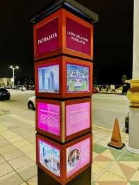 Flags, Lights & Midnight Calm – Putra Square at Night