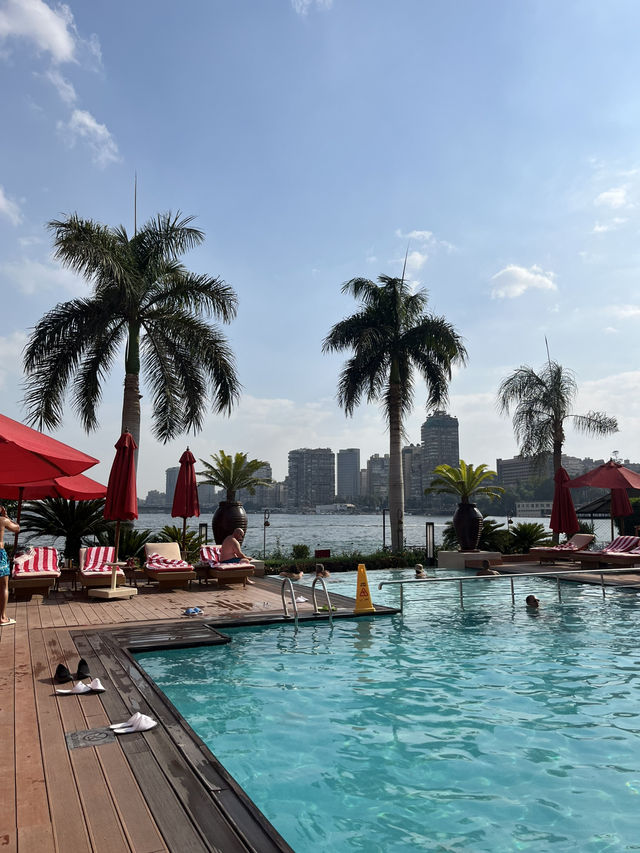 Poolside paradise… with the Nile as my infinity view 🛶☀️