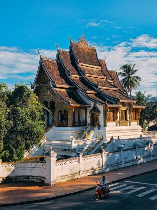 Why is Luang Prabang a popular destination for many backpackers?