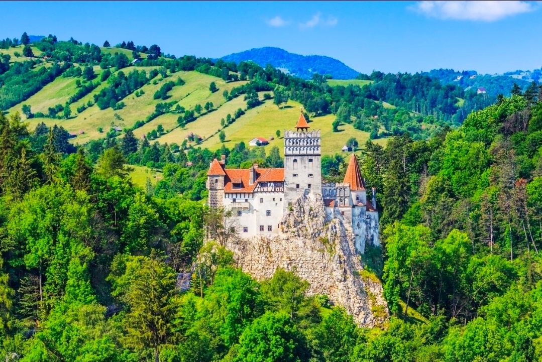 Bran Castle, Romania — A Mysterious Fairytale in the Heart of Transylvania 🏰🇷🇴

Rising dramatically above a rocky hillside in Transylvania, Bran Castle is one of Romania’s most fascinating historic landmarks. With its pointed towers, ancient stone walls, narrow stairways, and mountain surroundings, this remarkable castle looks as though it has stepped straight out of a medieval fairytale.

Bran Castle is world-famous for its association with the legend of Dracula. Although its connection to the fictional vampire is largely based on popular culture rather than proven historical links, the castle’s mysterious atmosphere has made it a favourite destination for history lovers and curious travellers from around the world.

Inside, visitors can explore historic rooms, traditional furnishings, exhibitions, and winding passageways that reveal glimpses of Romania’s royal and medieval past. Outside, the surrounding forests and mountain scenery create wonderful opportunities for photography throughout the year.

For a memorable visit, explore the castle early in the day if possible, wear comfortable shoes, and allow time to discover the charming village of Bran. Autumn brings beautiful colours, while winter can create a magical atmosphere when snow covers the surrounding landscape.

Nearby places to explore: Râșnov Fortress, the historic centre of Brașov, and the spectacular landscapes of Piatra Craiului National Park.

📍 Location: Bran, Brașov County, Transylvania, Romania

#BranCastle  #RomaniaTravel  #Transylvania  #DraculaCastle  #MedievalArchitecture  #EuropeanCastles  #HistoricPlaces  #MountainViews  #TravelMoments #naturalwonders #travel #travel2026 