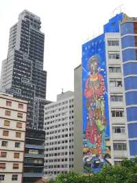 Colorfull huge street arts on the tall building 