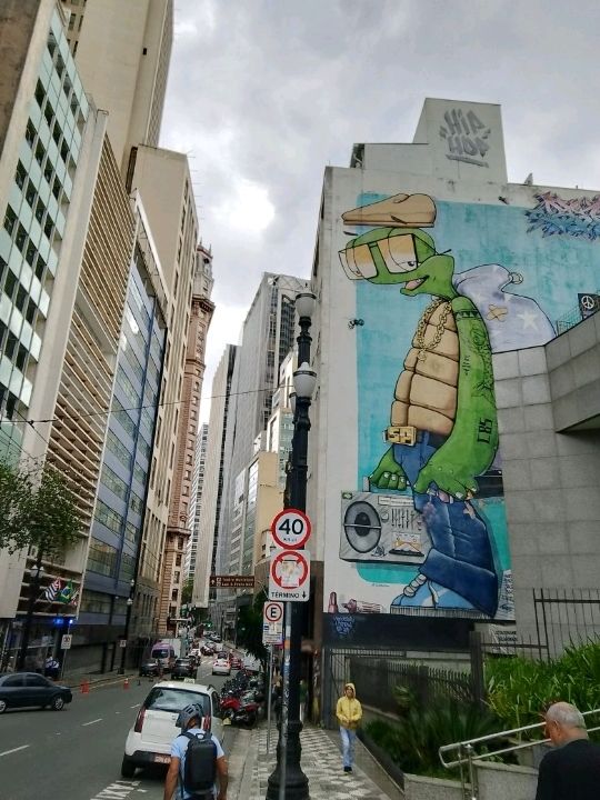 Colorfull huge street arts on the tall building 