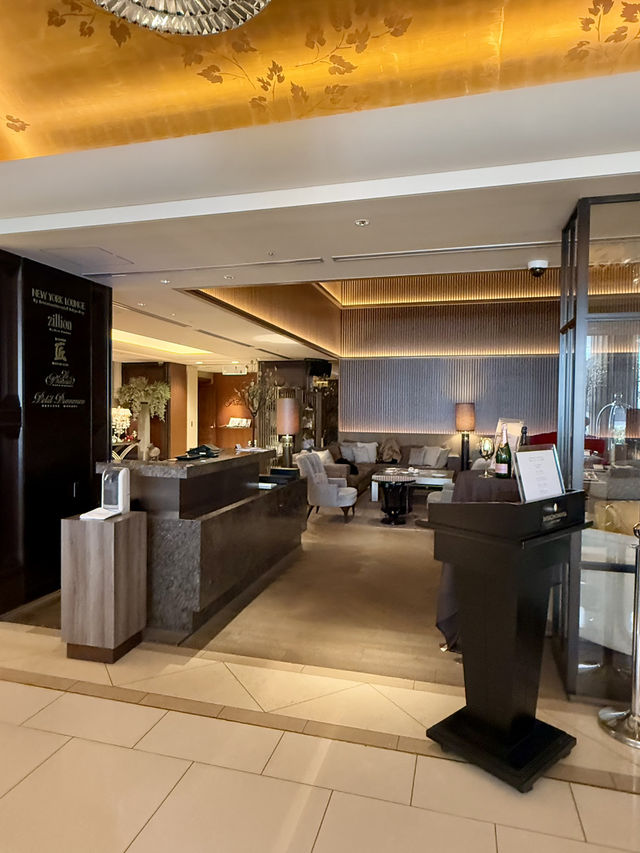 A lobby lounge with a fireplace🥂