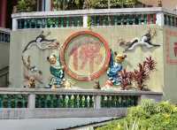 Vibrant stories on the Walls in Hall of Universal Brightness car park at Kong Meng San Temple