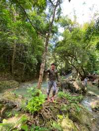A Picturesque Two Tiered Waterfall located in the Lush of Hill in Alegria