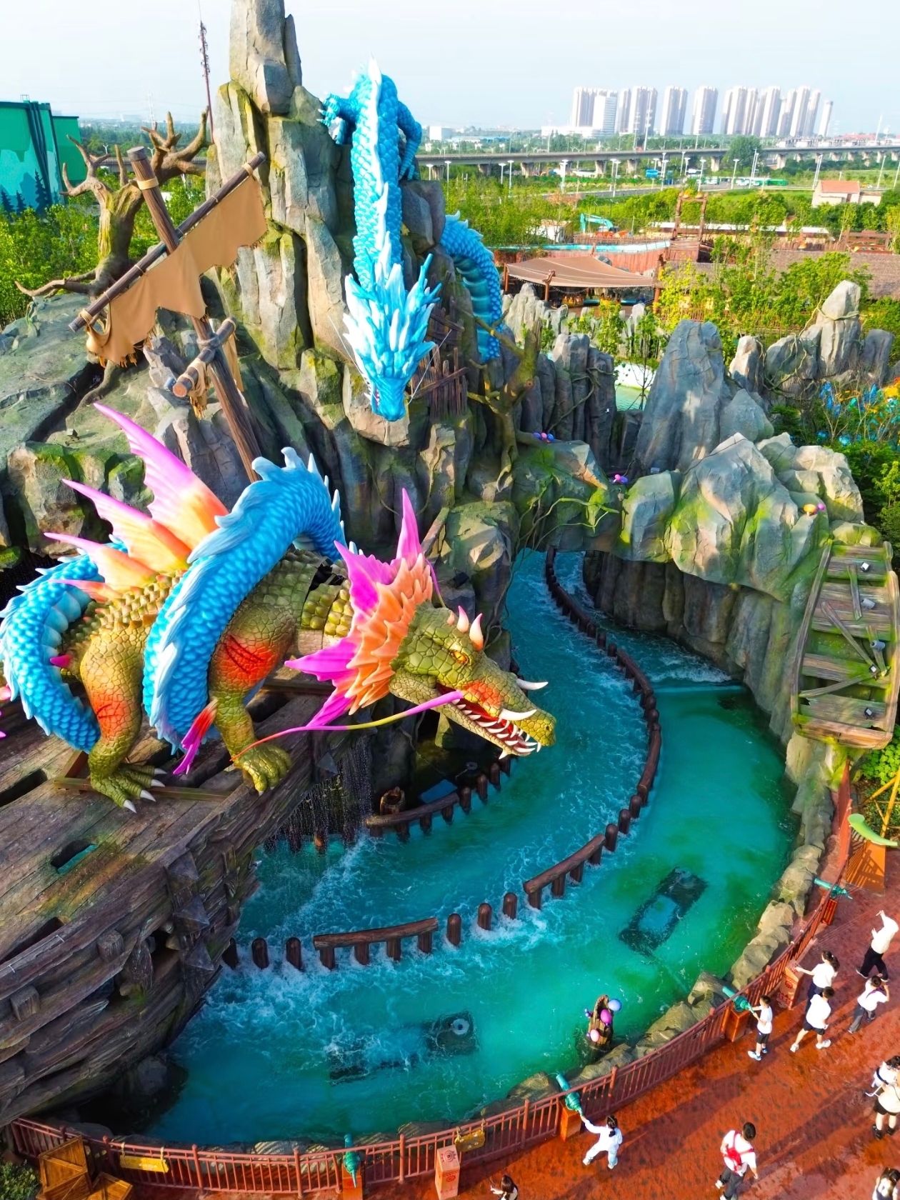 A new amusement park just 40 minutes from Wuhan. It's even accessible by metro.

In June 2026, a new family recreation center, the Fantawild Resort, opened in Xiaogan, Hubei Province. The main advantage for Wuhan residents and visitors is its location, just 40 minutes away, and accessible by metro.

📌How to get there from Wuhan

🚇 Metro + taxi (most convenient option):
Take Metro Line 2 to Aviation Headquarters Station. From the exit, it's a 15-minute taxi ride to the park.

🚗 By car:
Look for "Xiaogan Fantawild Tourism Area" in your GPS. The drive from central Wuhan is about 40 minutes on the expressway. Parking is RMB 20 per day, with the first 30 minutes free.

🚆 By train:
To Minji or Xiaogan East Station, then take a taxi or free shuttle.

🚌 By bus:
Route No. 12 and the special "Fantawild" line (open on weekends).

♥️What to see

The complex covers 70 hectares and includes three zones:

1. "Fantawild: Wild Continent" is the first dinosaur park in Central China. It features 9 indoor rides and over 30 outdoor attractions. The highlights include the "Cloud Rush" roller coaster with electromagnetic launch (accelerating to 90 km/h in seconds), "Flight" on a winged dragon, "Forest Journey" with the "Boonie Bears" characters, and "Dinosaur Crisis" with fire-breathing special effects.

2. Boonie Bears Invasion Water Park – 16 water attractions based on the animated film Boonie Bears: Prehistoric Age, including Hurricane Bay and Super Bowl.

3. Boonie Bears Hotel – 396 themed rooms with restaurants, a spa, and children's areas.

The park's signature feature is its immersive format: you're not just a spectator, but the hero of an adventure, traveling from a futuristic base to Dinosaur Valley and the Ancient Xia Tribe.

🕒Opening Hours: 9:30 AM–9:00 PM (until 9:30 PM on weekends).

💴Prices: Adults – 299 RMB, children (1.1–1.4 m) and seniors (65 and up) – 199 RMB, children under 1.1 m – free.

Bottom line: the park, 40 minutes from Wuhan and accessible by metro with a taxi, is an ideal option for a day trip with the family. Fantawild promises to become the premier entertainment destination in Central China by 2026.
