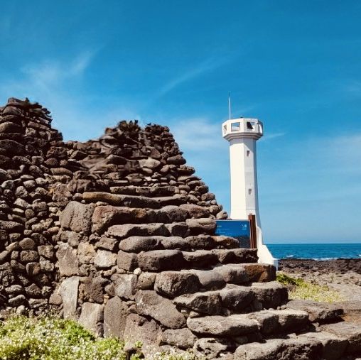 A Picturesque Coastal Beacon with Rustic Charm
