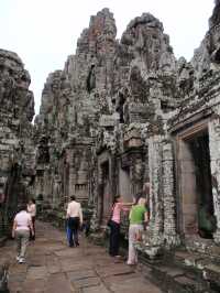 Whispers of Stone: A Morning at Bayon Temple