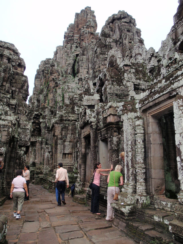 Whispers of Stone: A Morning at Bayon Temple