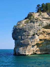Discover the wild beauty of the crystal blue water and sandstone cliffs along Lake Superior in MI