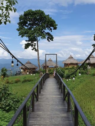 🌿 Sajek Valley – The Kingdom of Clouds in Bangladesh

Sajek Valley is one of the most breathtaking tourist destinations in Bangladesh, located in Baghaichhari Upazila of Rangamati District. Perched at an elevation of around 1,800 feet above sea level, Sajek is famously known as the “Kingdom of Clouds.” Surrounded by endless green hills, floating clouds, and fresh mountain air, it offers a peaceful escape from the busy city life.

Top Attractions

1. Sajek Helipad

The most popular viewpoint in Sajek. It offers stunning panoramic views and is the best place to watch both sunrise and sunset.

2. Konglak Hill

One of the highest points in Sajek Valley. From here, visitors can enjoy breathtaking views of the surrounding hills and, on clear days, even see the Lushai Hills of India.

3. Ruilui Village

A beautiful indigenous village where you can experience the lifestyle, traditions, and culture of the local communities, including the Lusai and Chakma people.

4. Hazachara Waterfall

Located on the way to Sajek, this scenic waterfall becomes especially beautiful during the rainy season and is a popular stop for travelers.

How to Reach Sajek

· Dhaka to Khagrachari: Travel by AC or non-AC bus (approximately 8–10 hours).
· Khagrachari to Sajek: Hire a local jeep, commonly known as a “Chander Gari,” for a 2 to 2.5-hour journey through picturesque mountain roads.

Estimated Travel Cost (Per Person)

Transportation

· Dhaka → Khagrachari (Non-AC Bus): BDT 700–1,000
· Dhaka → Khagrachari (AC Bus): BDT 1,200–1,800
· Khagrachari → Sajek (Shared Jeep): BDT 800–1,500
· Reserved Jeep: BDT 10,000–15,000 (depending on season and vehicle)

Accommodation

· Budget Cottage: BDT 1,500–2,500 per room
· Mid-range Resort: BDT 3,000–6,000 per room
· Premium Resort: BDT 6,000–12,000+ per room

Food

· Breakfast: BDT 100–200
· Lunch or Dinner: BDT 250–500
· Daily Food Budget: BDT 500–1,000

Total Estimated Budget

For a 2-day, 1-night trip, expect to spend approximately BDT 4,500–8,000 per person, depending on your choice of transport, accommodation, and dining.

Best Time to Visit

· June to September: Ideal for experiencing the famous sea of clouds during the monsoon season.
· October to February: Pleasant weather, clear skies, and breathtaking mountain views.

Travel Tips

· Carry a valid photo ID.
· Book your hotel in advance, especially during weekends and holidays.
· Bring comfortable walking shoes, sunscreen, and a light jacket.
· During the rainy season, carry a raincoat or umbrella.
· Respect the local indigenous communities, their culture, and the natural environment by avoiding littering.
#SajekValley #Sajek #BeautifulBangladesh #VisitBangladesh #HillTracts #CloudKingdom #NatureLovers #MountainViews #TravelPhotography #GalivVerse #TravelWithGaliv