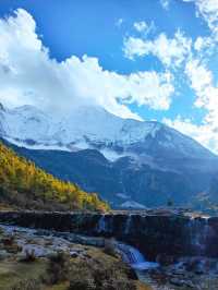 去稻城亞丁看山。