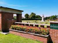 Labuan War Cemetery: Where History Whispers Among the Flowers 🌺✝️