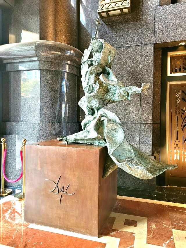 Heroic sculptures at ATLAS bar