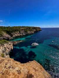 Turquoise Dreams and Sandy Toes at Cala Llombards