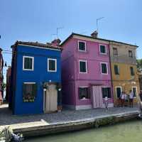 Visit Burano to see colorful buildings
