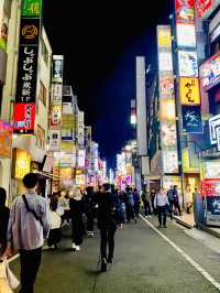 Godzilla and the bustling street of Shinjuku
