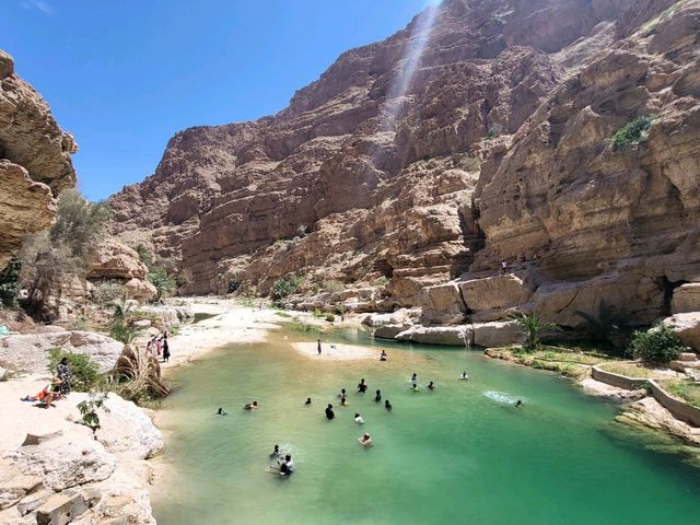 oasis in the middle of mountains and desert  oman